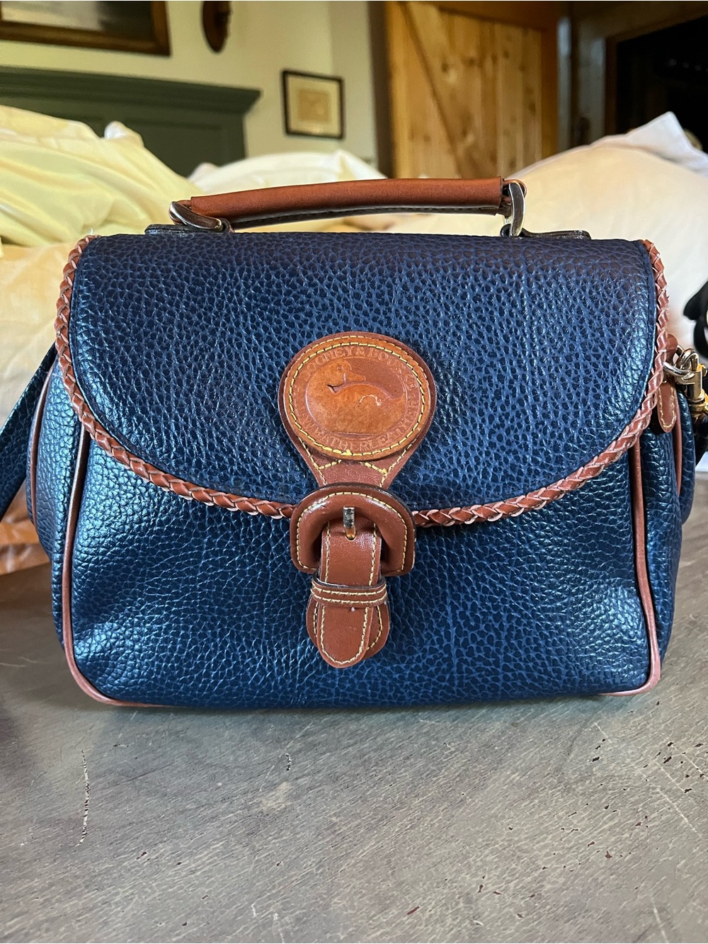 Dooney & Bourke Navy Pebbled Leather Satchel with Brown Trim